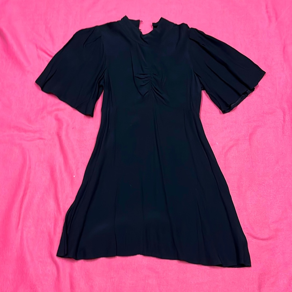 Little Black Dress, Free People
Tight fit up top, slight flare at the bottom